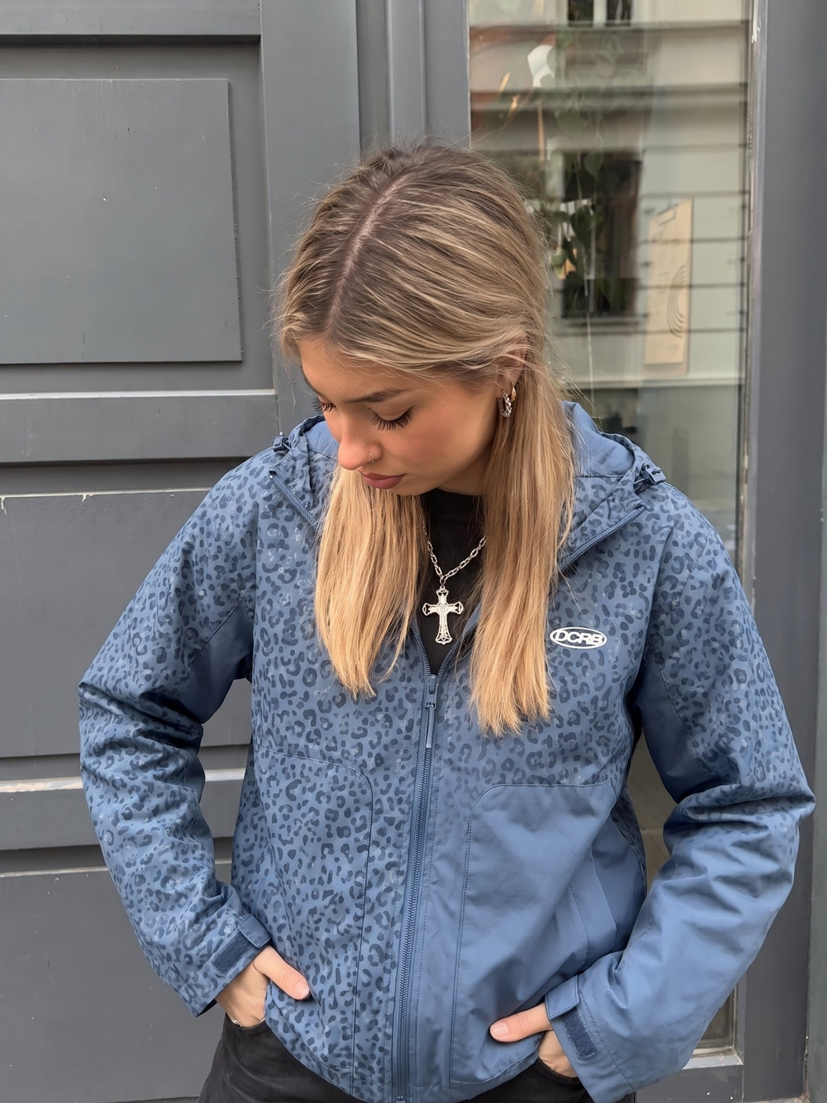DCRB Negro con estampado de guepardo reactivo al agua Chaqueta impermeable