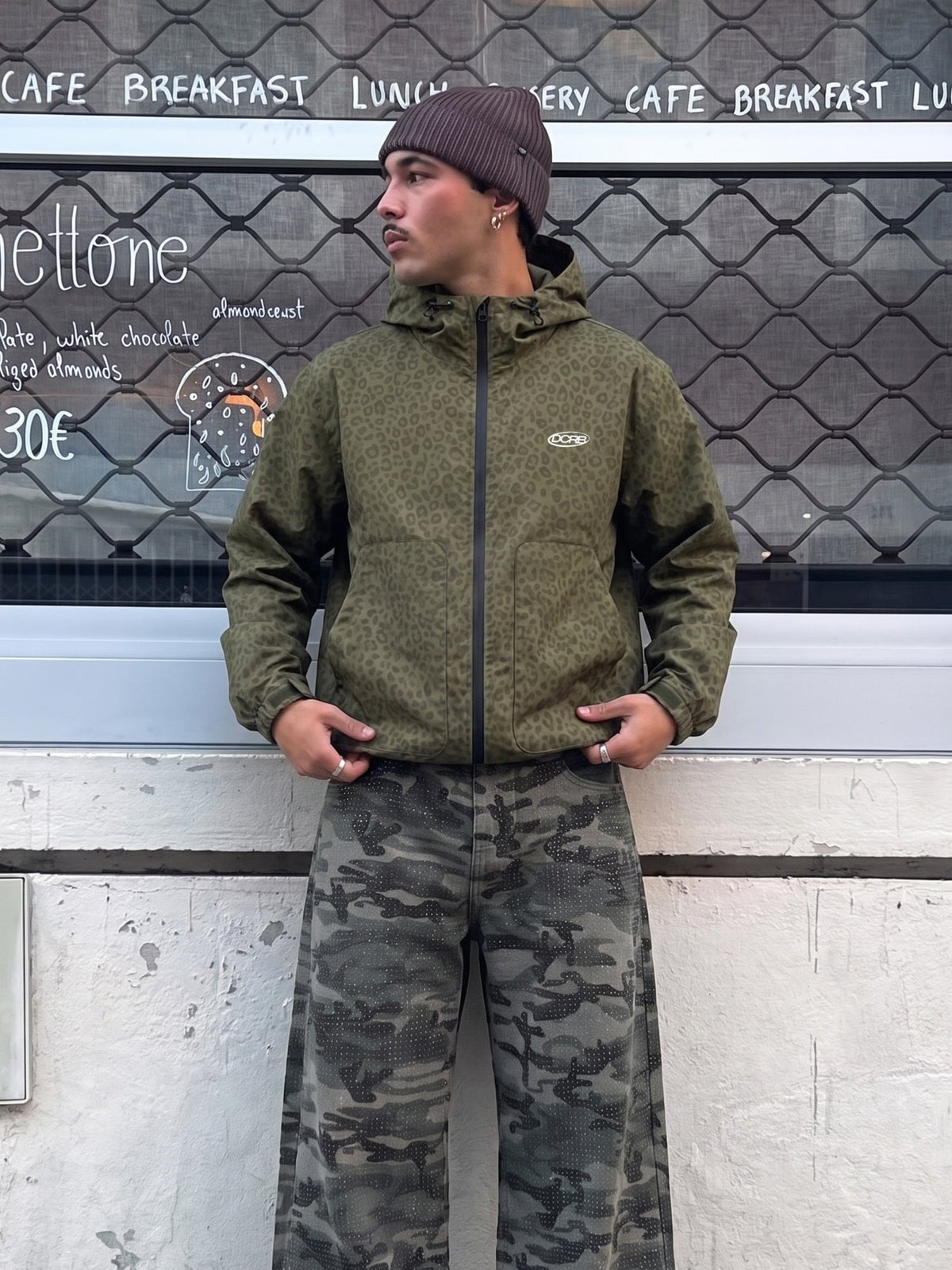 DCRB Negro con estampado de guepardo reactivo al agua Chaqueta impermeable
