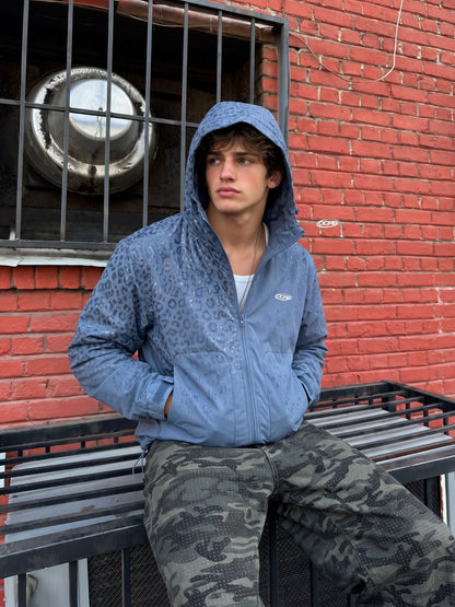 DCRB Negro con estampado de guepardo reactivo al agua Chaqueta impermeable